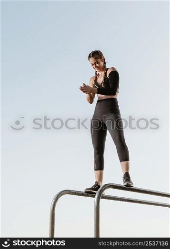 athletic woman doing fitness training outdoors