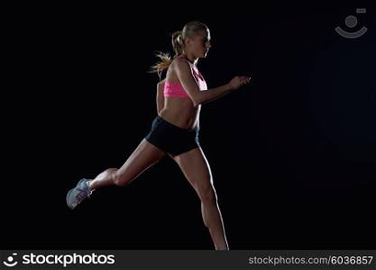 Athletic woman running onrace track