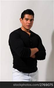 Athletic young man in a black shirt and jeans
