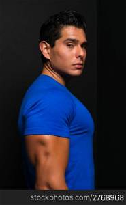 Athletic young man in a blue tee shirt