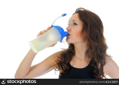 athletic young woman with protein shake bottle. Isolated on white background