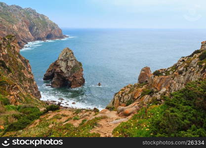 Atlantic ocean coast in cloudy weather. View from Cape Roca (Cabo da Roca), Portugal.