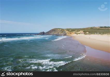 Atlantic ocean coast landscape near Amoreira beach, Algarve, Portugal