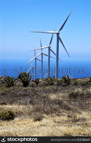 atlantic ocean in isle of lanzarote spain africa wind turbines and the sky