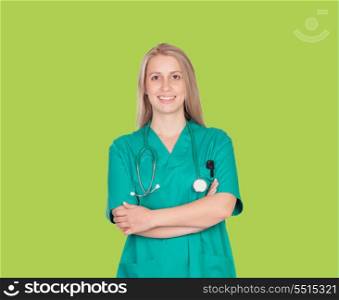 Atractive medical girl on a green background