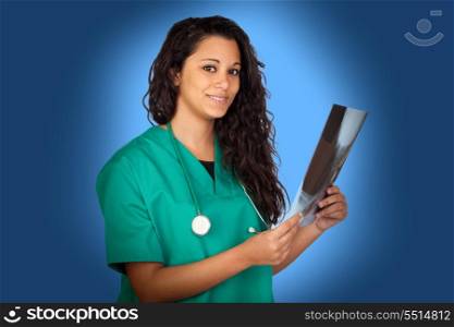 Atractive medical with a radiography on blue background