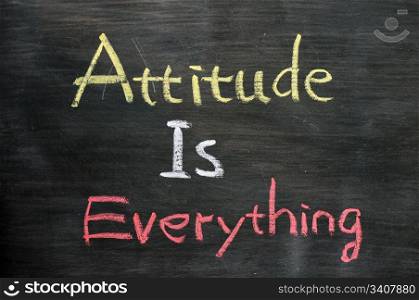 Attitude is everything - Text written with chalk on a blackboard