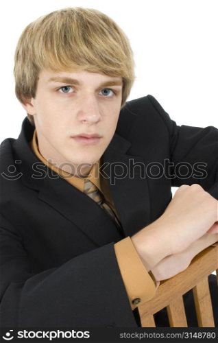 Attractive 15 year old teen boy in suit.