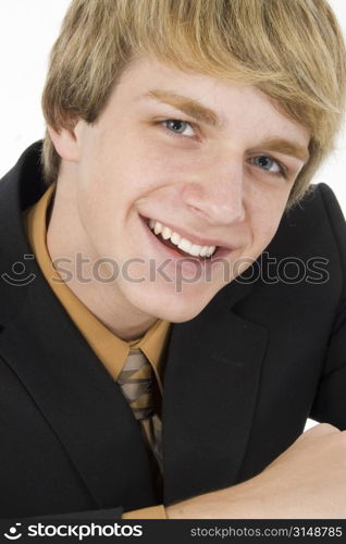 Attractive 15 year old teen boy in suit.