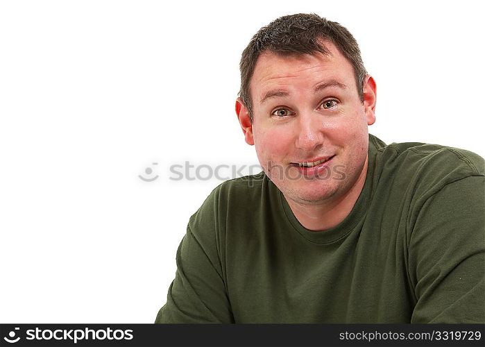 Attractive 35 year old man sitting and smiling over white background.