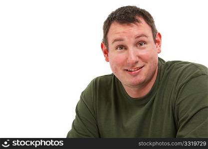 Attractive 35 year old man sitting and smiling over white background.
