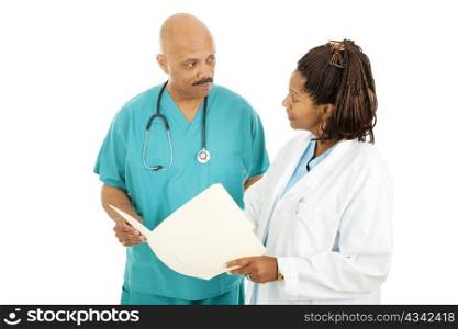 Attractive african-american medical doctors read a patient&rsquo;s chart. Isolated on white.