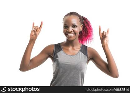 Attractive african fitness woman in sport clothes gesturing rock isolated on white background