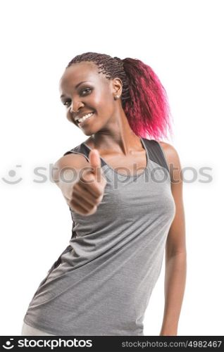 Attractive african fitness woman in sport clothes gesturing thumbs up isolated on white background