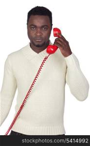 Attractive african man with a red phone isolated on a over white background
