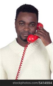 Attractive african man with a red phone isolated on a over white background