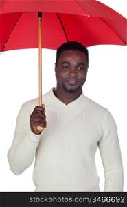 Attractive african man with a red umbrella isolated on a over white background