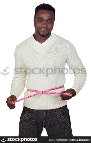 Attractive african man with a tape measure isolated on a over white background