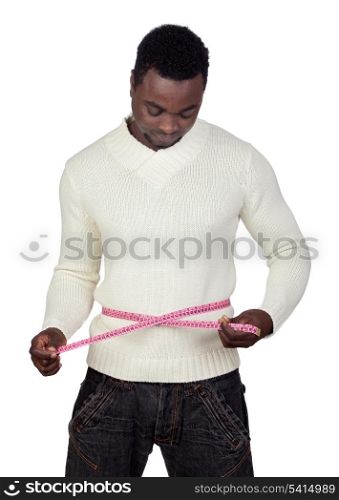 Attractive african man with a tape measure isolated on a over white background