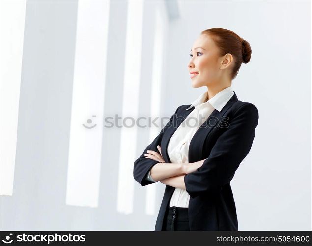 Attractive asian businesswoman in formal suit. Image of young asian businesswoman in formal suit