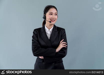 Attractive asian female call center operator with happy smile face advertises job opportunity on empty space, wearing a formal suit and headset on customizable isolated background. Enthusiastic. Attractive Asian operator with formal suit and headset. Enthusiastic