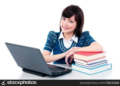 Attractive Asian female student with laptop and books