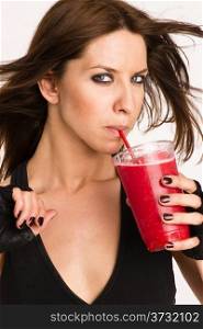 Attractive Athletic Female ShowsHappy Holding Refreshing Blended Food Fruit Smothie Drink