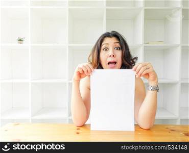 Attractive beautiful woman holding blank white paper.. Asian woman holding blank white paper