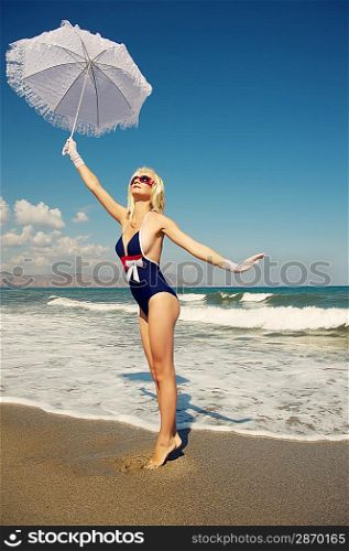 Attractive blond woman in the sea