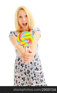 Attractive blonde with lollipop surprised and happy