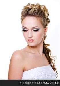Attractive bride with style wedding hairstyle - isolated