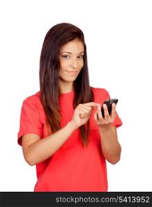 Attractive brunette girl dressed in red with a mobile isolated on a white background