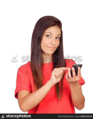 Attractive brunette girl dressed in red with a mobile thinking isolated on a white background