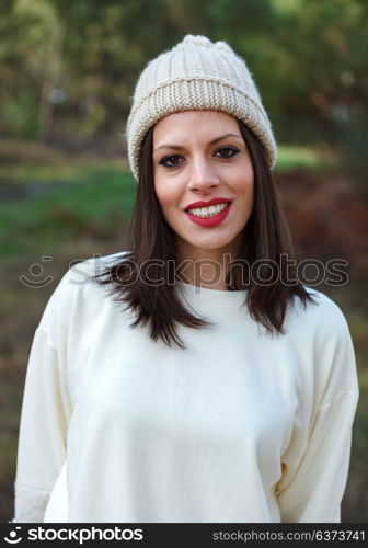 Attractive brunette girl enjoying a day in the countryside