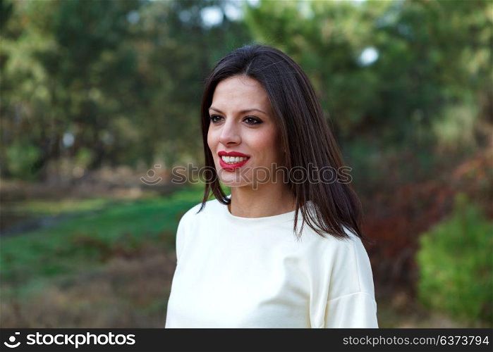 Attractive brunette girl enjoying a day in the countryside