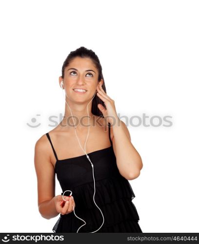 Attractive brunette girl looking up and listening to music isolated on a white background