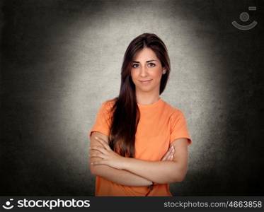 Attractive brunette girl on a over irregular background