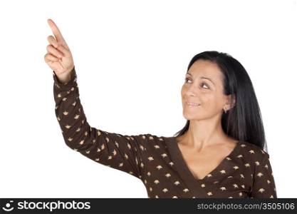 Attractive brunette girl pointing with the finger isolated on white background