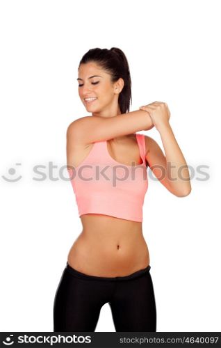Attractive brunette girl stretching arms after the training isolated on a white background