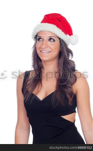 Attractive brunette girl with Christmas hat isolated on a white background