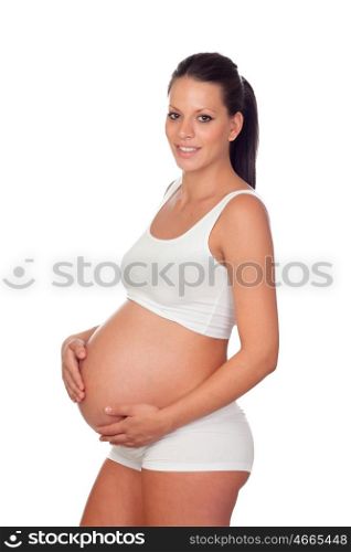 Attractive brunette pregnant girl in underwear isolated on a white background