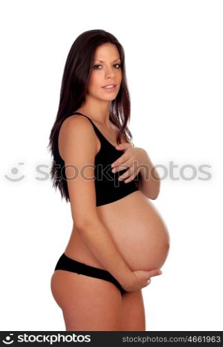 Attractive brunette pregnant in underwear girl isolated on a white background