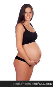 Attractive brunette pregnant in underwear isolated on a white background