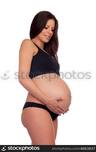 Attractive brunette pregnant in underwear isolated on a white background
