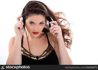 Attractive brunette wearing headphones