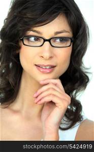 Attractive brunette wearing trendy glasses