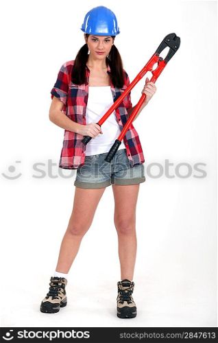 Attractive brunette with bolt-cutters