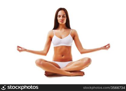 attractive brunette woman in yoga pose
