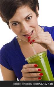 Attractive Brunette Woman sips Green Food Fruit Smoothie