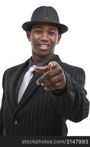 Attractive Business Man In Pin Striped Suit & Hat Pointing To Camera.